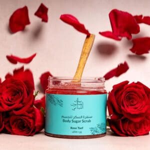 Naturally luxurious Rose Taif Body Sugar Scrub by House of Soap surrounded by roses
