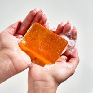 Naturally luxurious, fragrant and handmade skincare Glycerin Soap by House of Soap lathering in hands